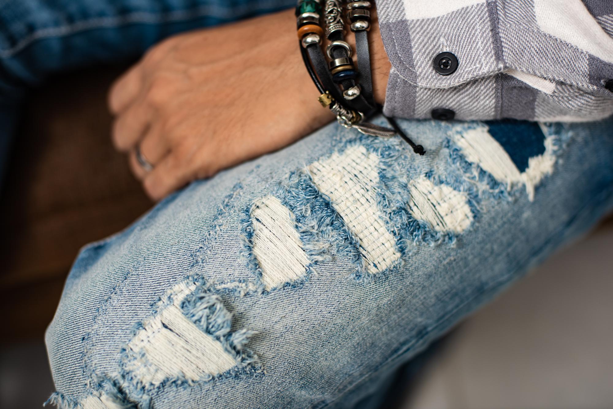 Worn embroidered patches with faded thread tones